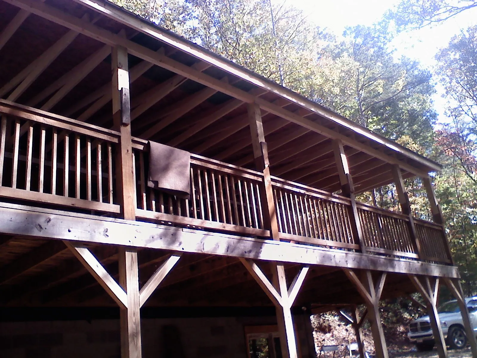 Timber framing under a new elevated porch and deck — Roof Leak Repair in Gate by Roofing Brothers